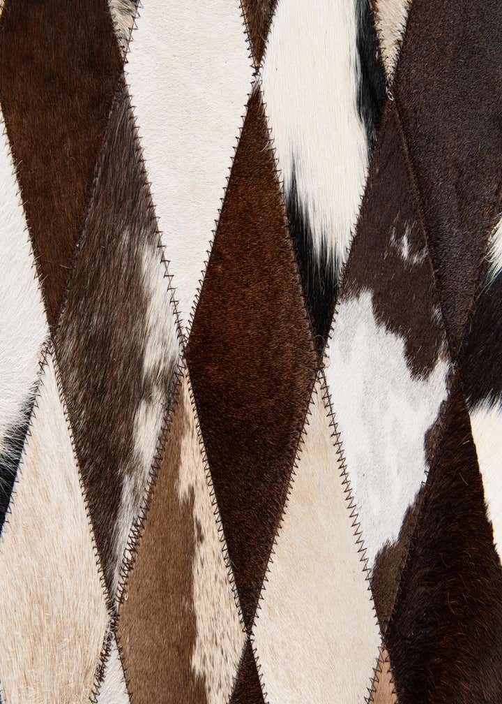 6' 6 x 9' 10 Cowhide Stocks Rug