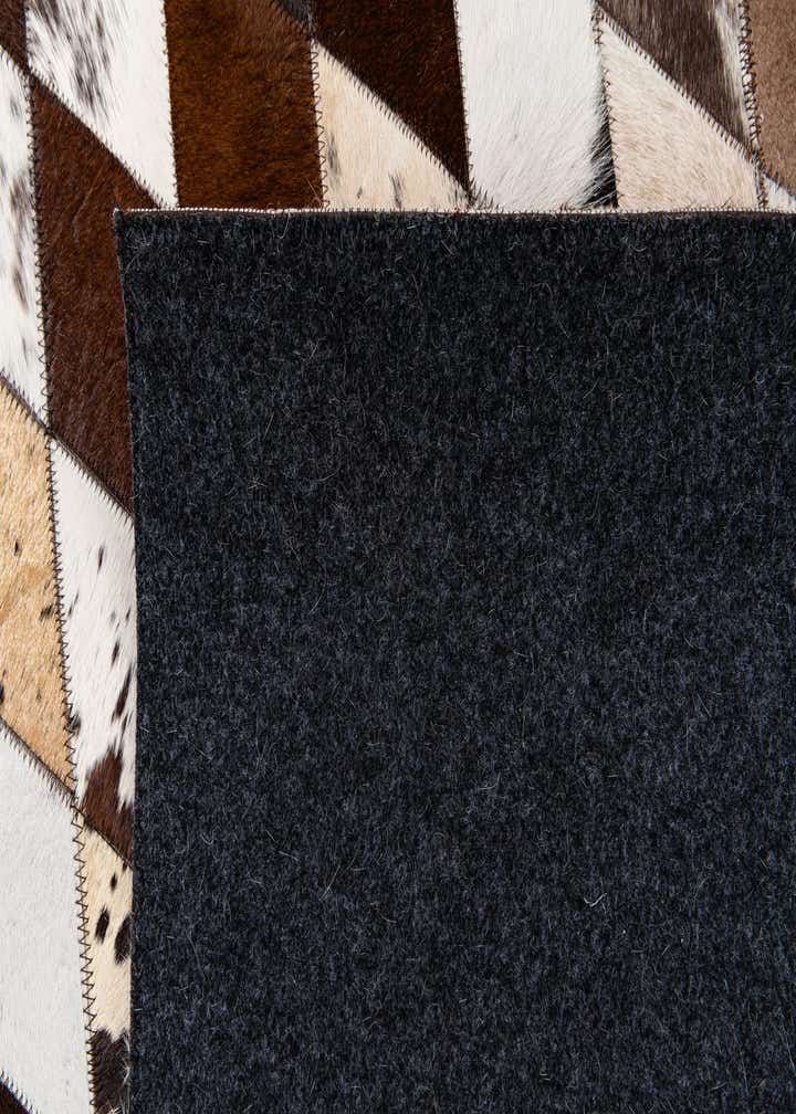 6' 6 x 9' 10 Cowhide Stocks Rug
