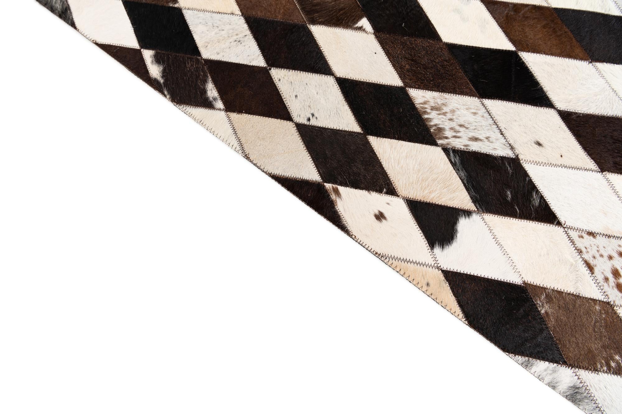 6' 7 x 9' 10 Cowhide Stocks Rug