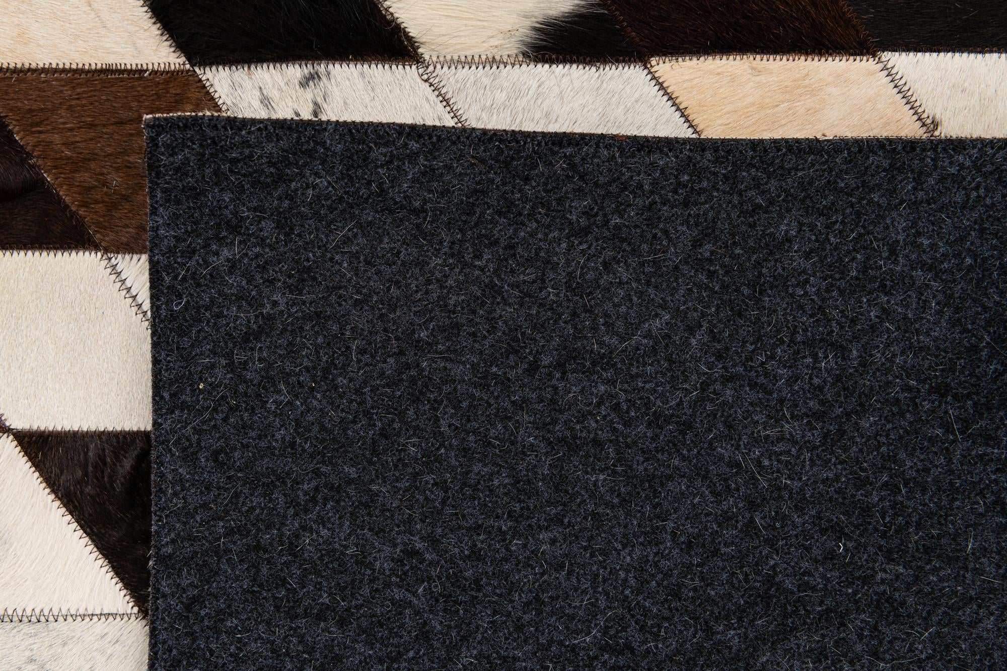 6' 7 x 9' 10 Cowhide Stocks Rug