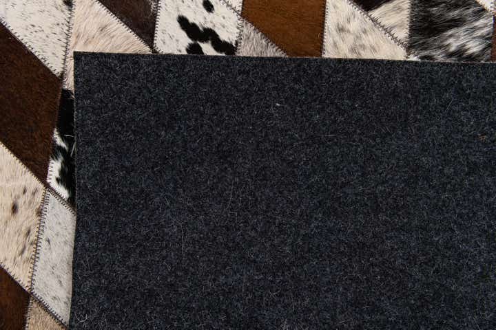 6' 7 x 9' 10 Cowhide Stocks Rug