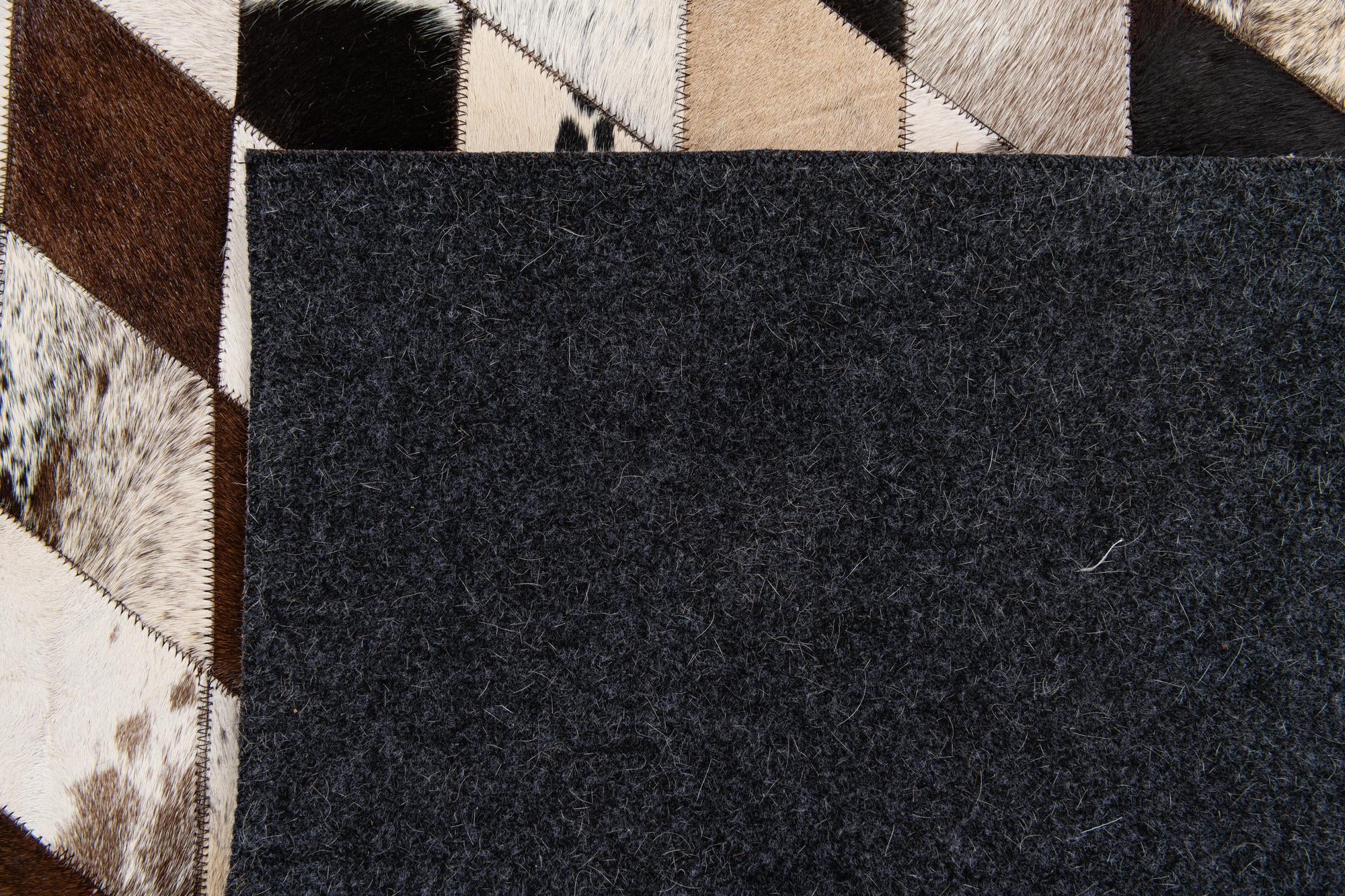 6' 7 x 9' 10 Cowhide Stocks Rug