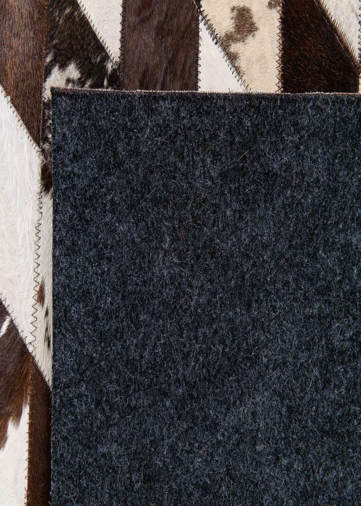 6' 8 x 9' 11 Cowhide Stocks Rug