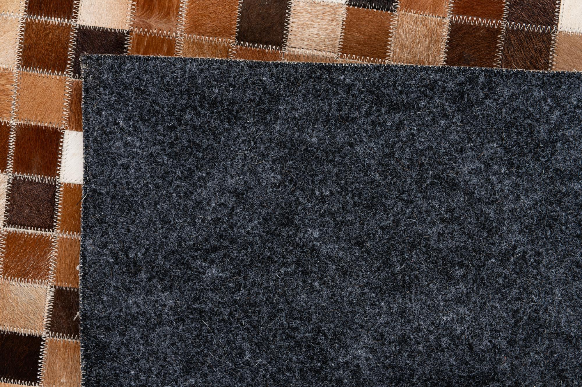 6' 7 x 9' 9 Cowhide Stocks Rug