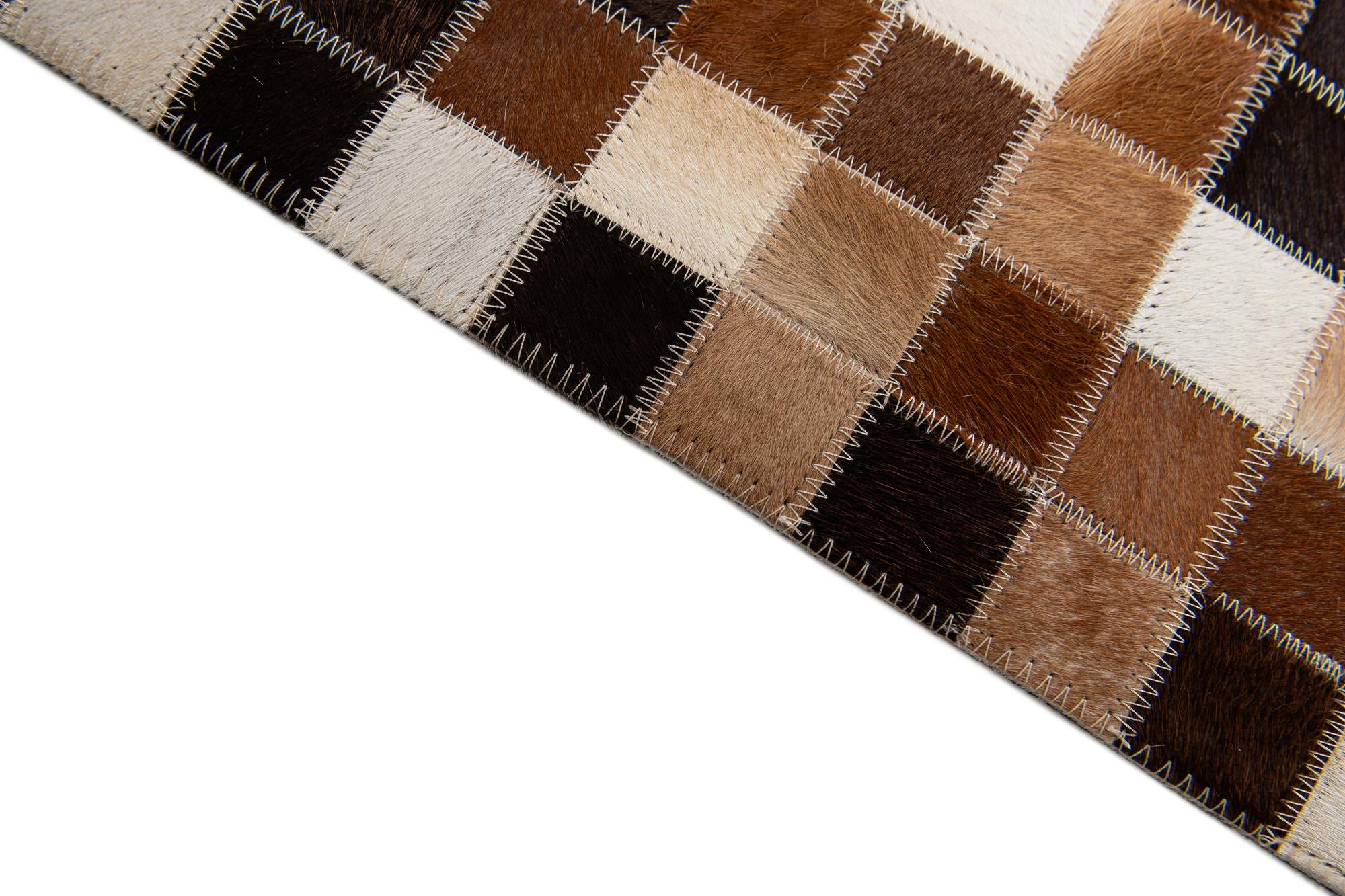 6' 9 x 9' 9 Cowhide Stocks Rug