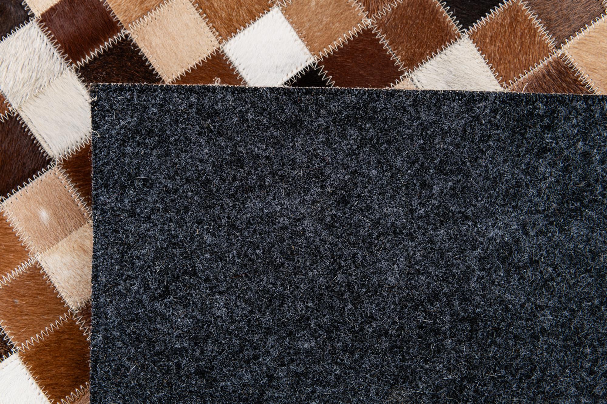 6' 8 x 9' 10 Cowhide Stocks Rug