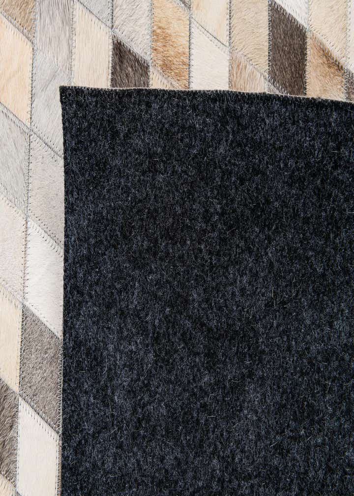 6' 7 x 9' 11 Cowhide Stocks Rug