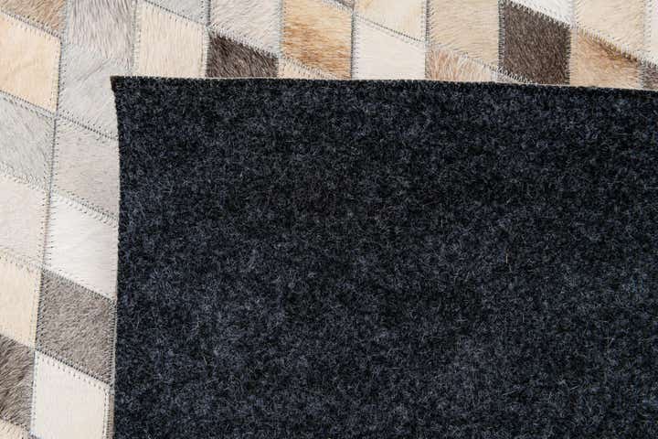 6' 7 x 9' 11 Cowhide Stocks Rug