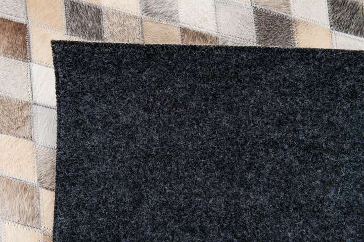 6' 7 x 9' 11 Cowhide Stocks Rug