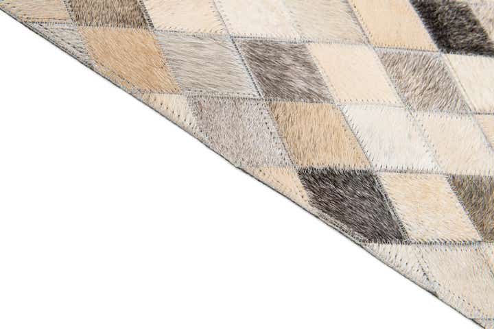 6' 8 x 9' 11 Cowhide Stocks Rug