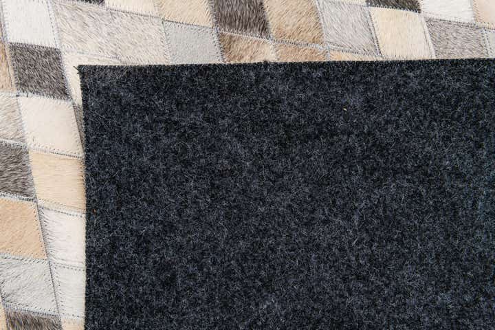 6' 8 x 9' 9 Cowhide Stocks Rug