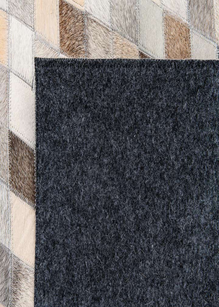 6' 8 x 9' 9 Cowhide Stocks Rug