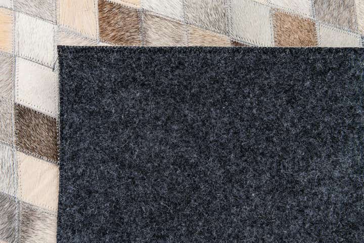 6' 8 x 9' 9 Cowhide Stocks Rug
