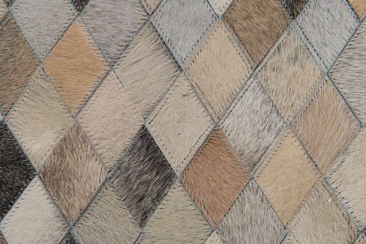 6' 7 x 9' 11 Cowhide Stocks Rug