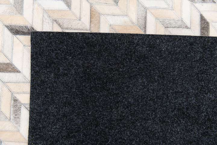 6' 8 x 9' 10 Cowhide Stocks Rug