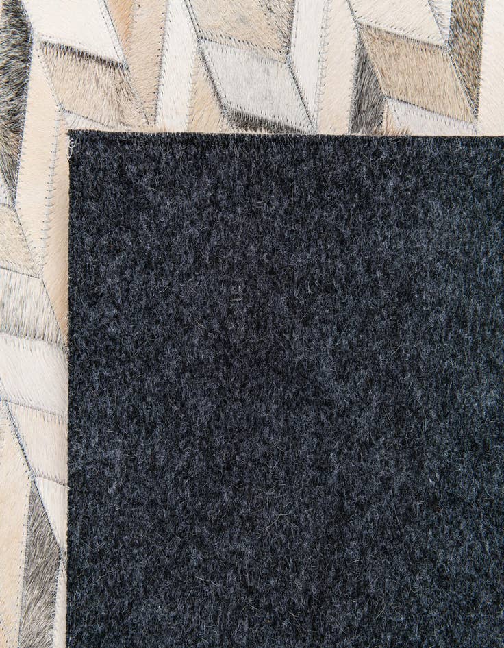 Detail image of 6' 7 x 10' Cowhide Stocks Rug