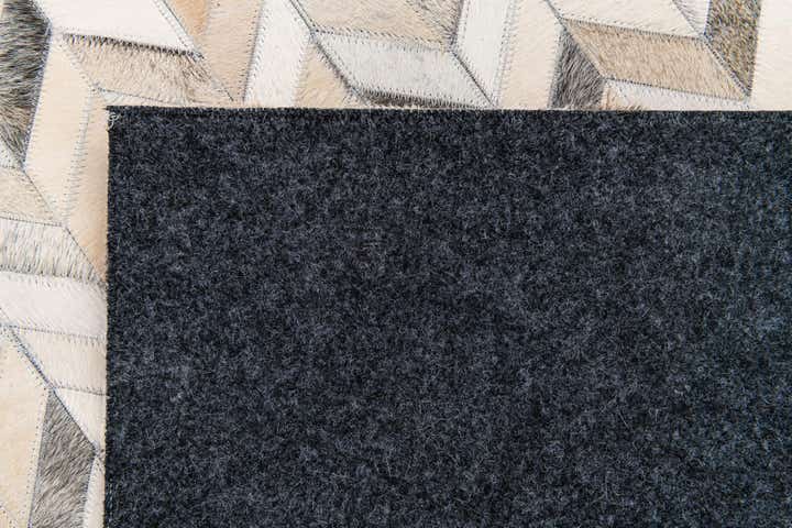 6' 7 x 10' Cowhide Stocks Rug