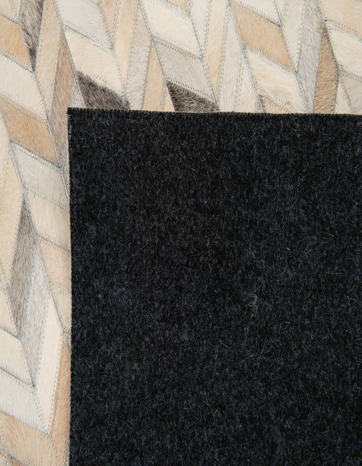 Detail image of 6' 8 x 9' 10 Cowhide Stocks Rug