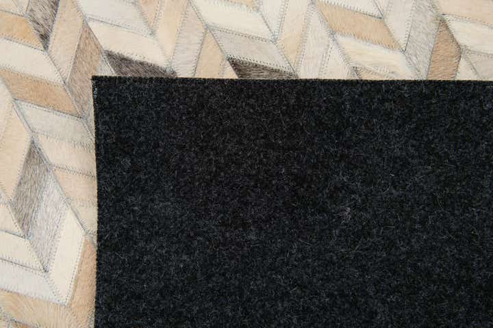 6' 8 x 9' 10 Cowhide Stocks Rug