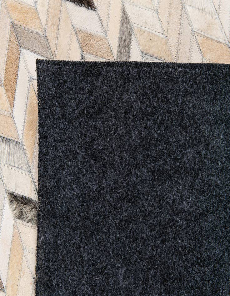 Detail image of 6' 8 x 9' 11 Cowhide Stocks Rug