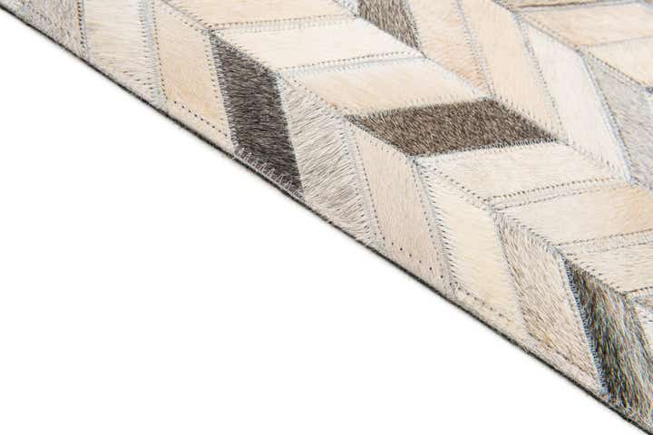 6' 7 x 9' 10 Cowhide Stocks Rug