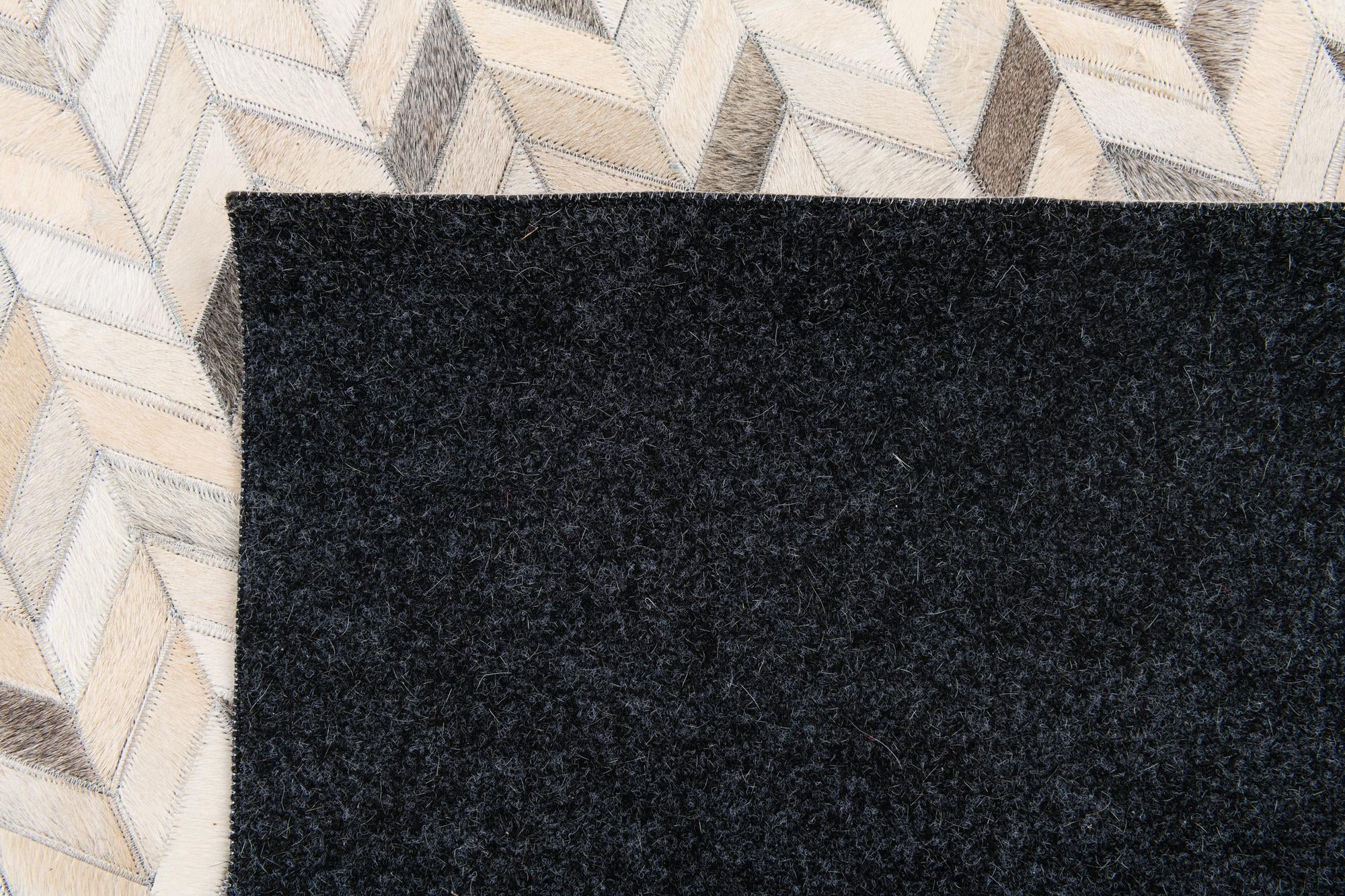 6' 7 x 9' 10 Cowhide Stocks Rug