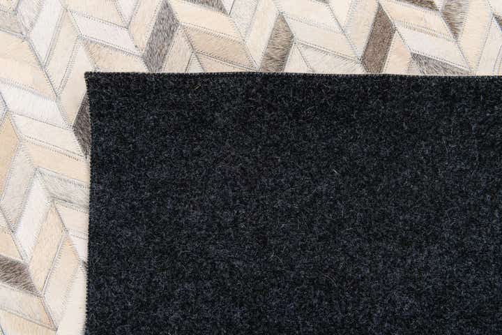 6' 7 x 9' 10 Cowhide Stocks Rug