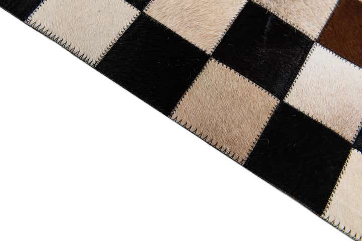 4' 9 x 6' 7 Cowhide Stocks Rug