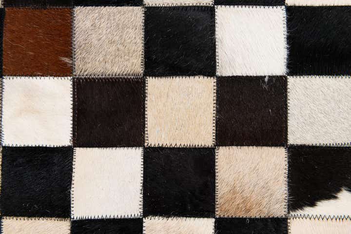 4' 9 x 6' 7 Cowhide Stocks Rug