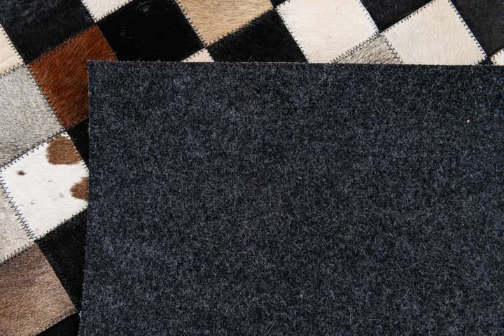 4' 9 x 6' 7 Cowhide Stocks Rug