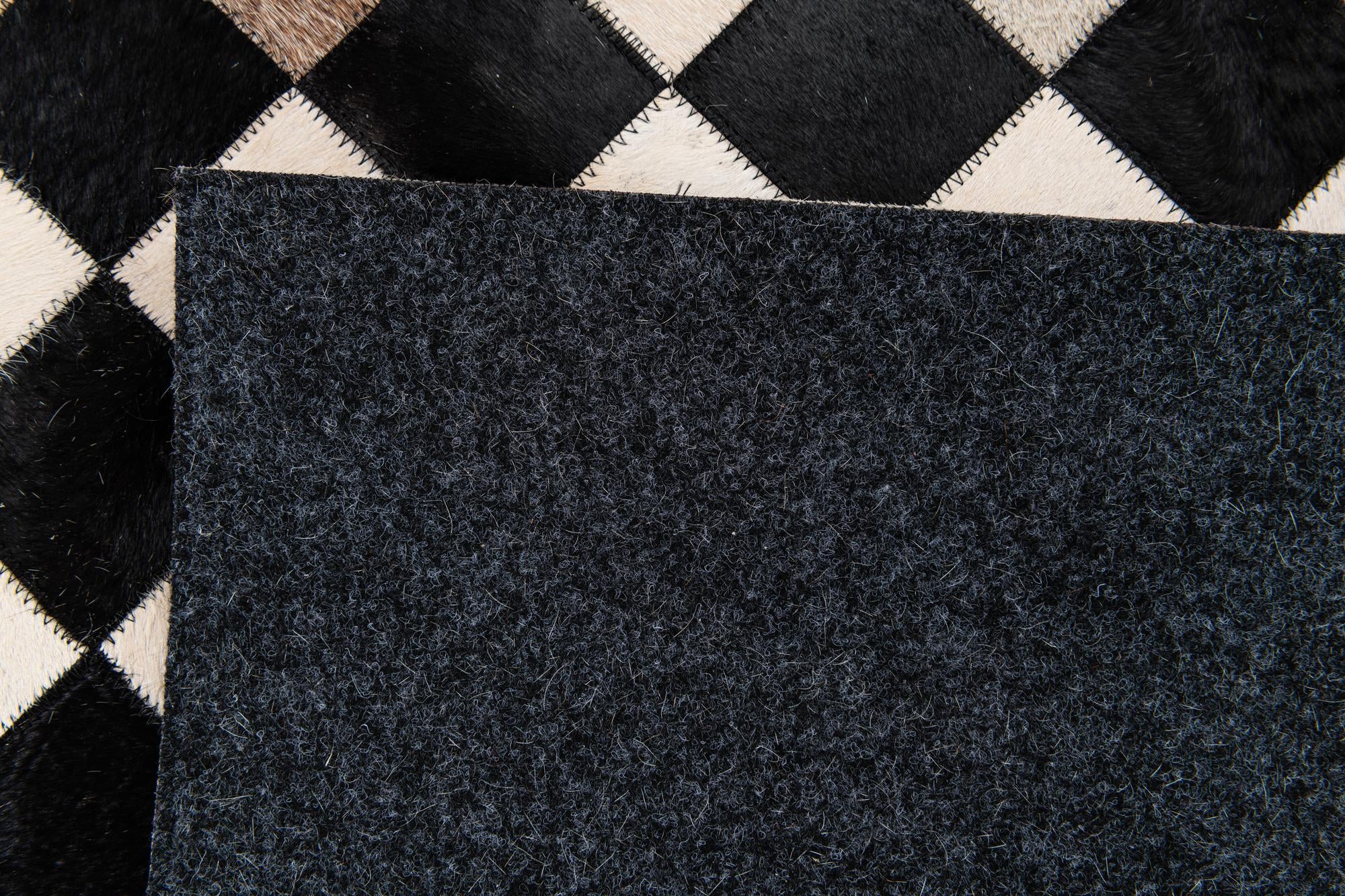 4' 9 x 6' 8 Cowhide Stocks Rug