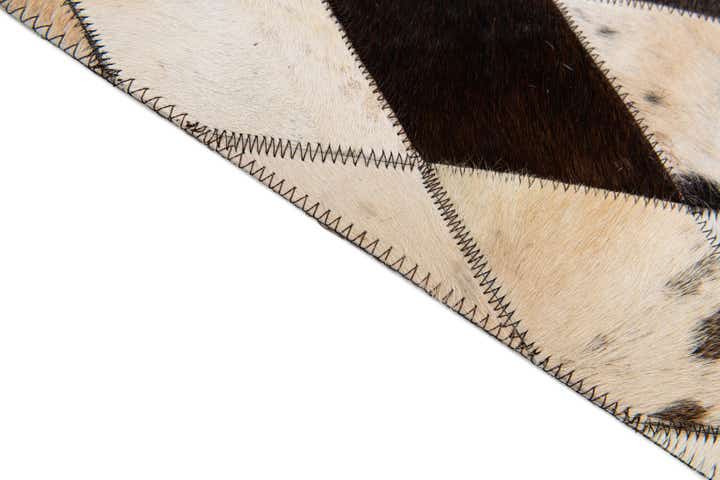 4' 8 x 6' 9 Cowhide Stocks Rug