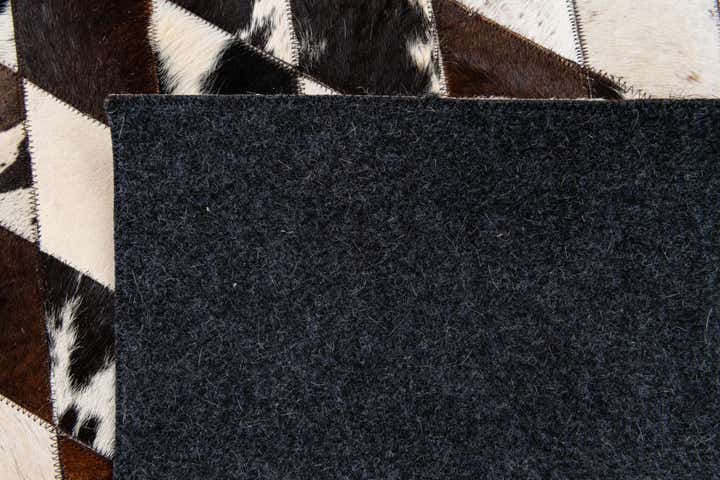 4' 8 x 6' 9 Cowhide Stocks Rug