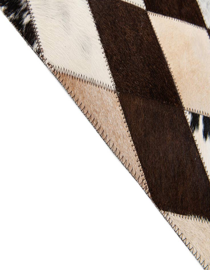 Detail image of 4' 8 x 6' 9 Cowhide Stocks Rug