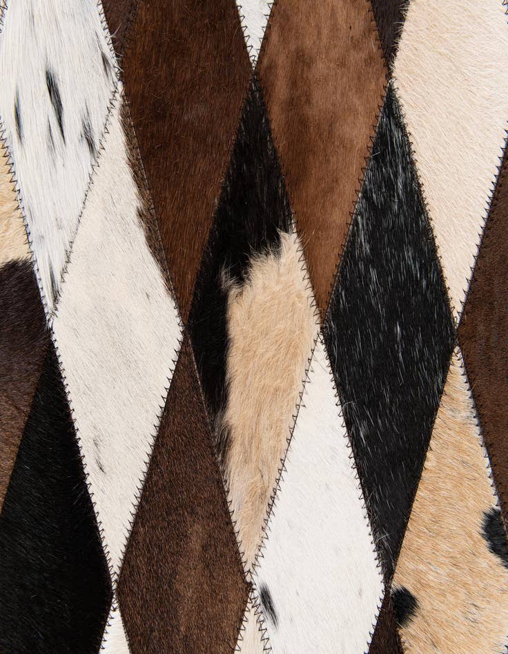 Detail image of 4' 8 x 6' 9 Cowhide Stocks Rug