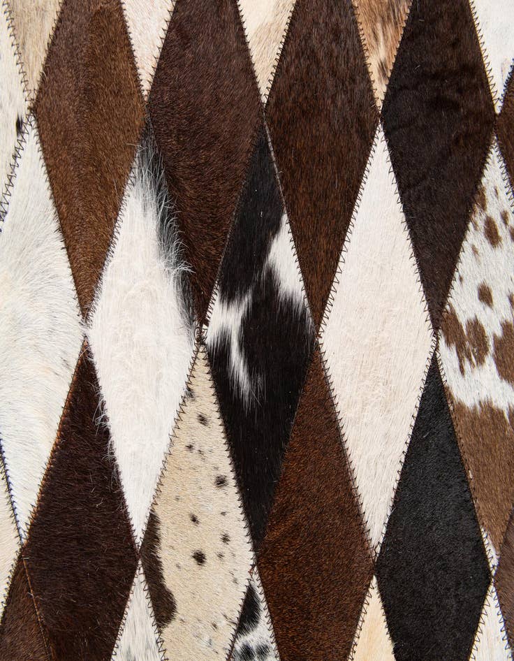 Detail image of 4' 8 x 6' 9 Cowhide Stocks Rug