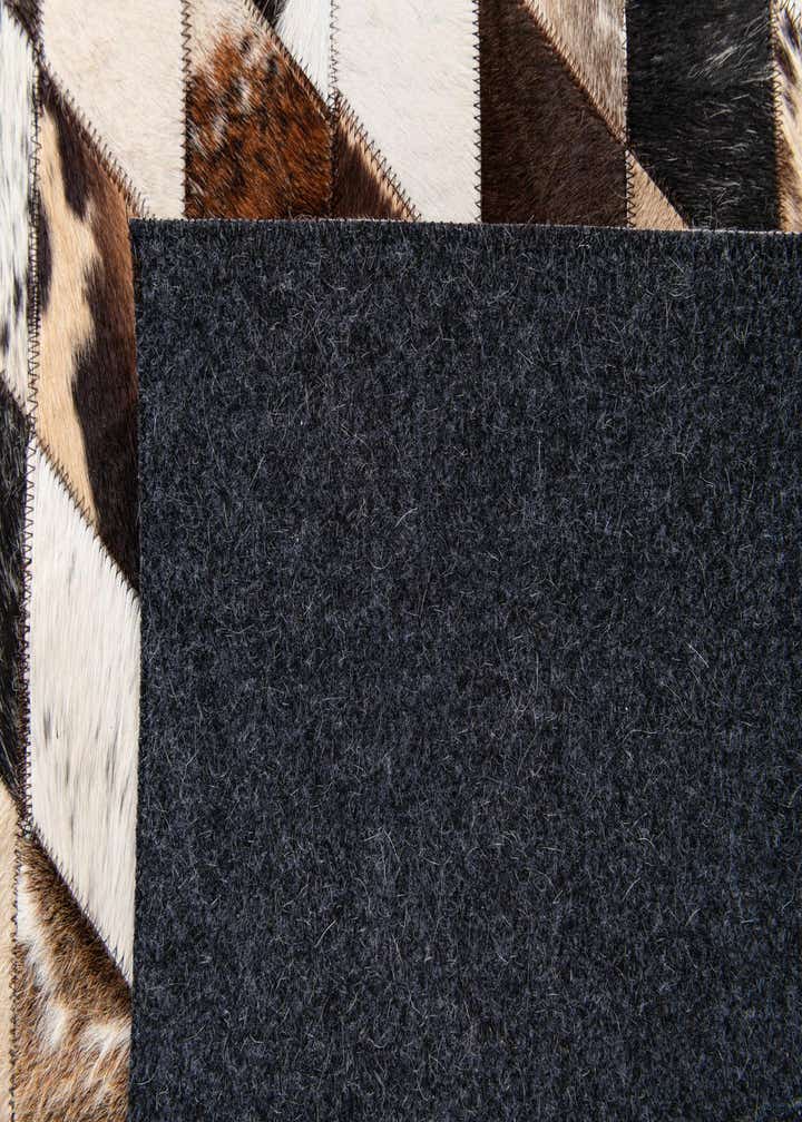 4' 8 x 6' 9 Cowhide Stocks Rug
