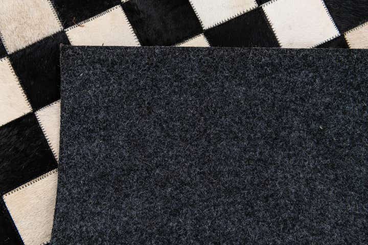 4' 9 x 6' 8 Cowhide Stocks Rug