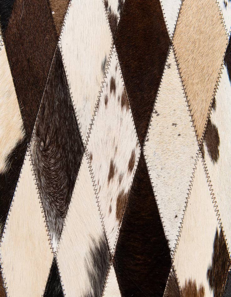 Detail image of 4' 8 x 6' 9 Cowhide Stocks Rug