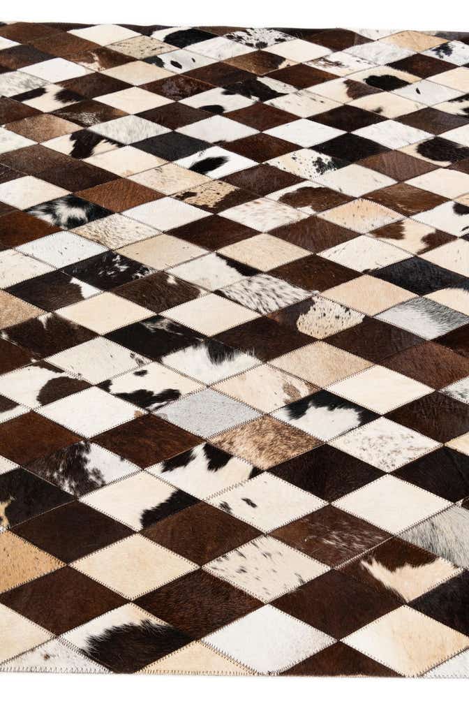 4' 8 x 6' 9 Cowhide Stocks Rug