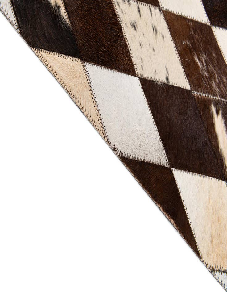 Detail image of 4' 8 x 6' 9 Cowhide Stocks Rug