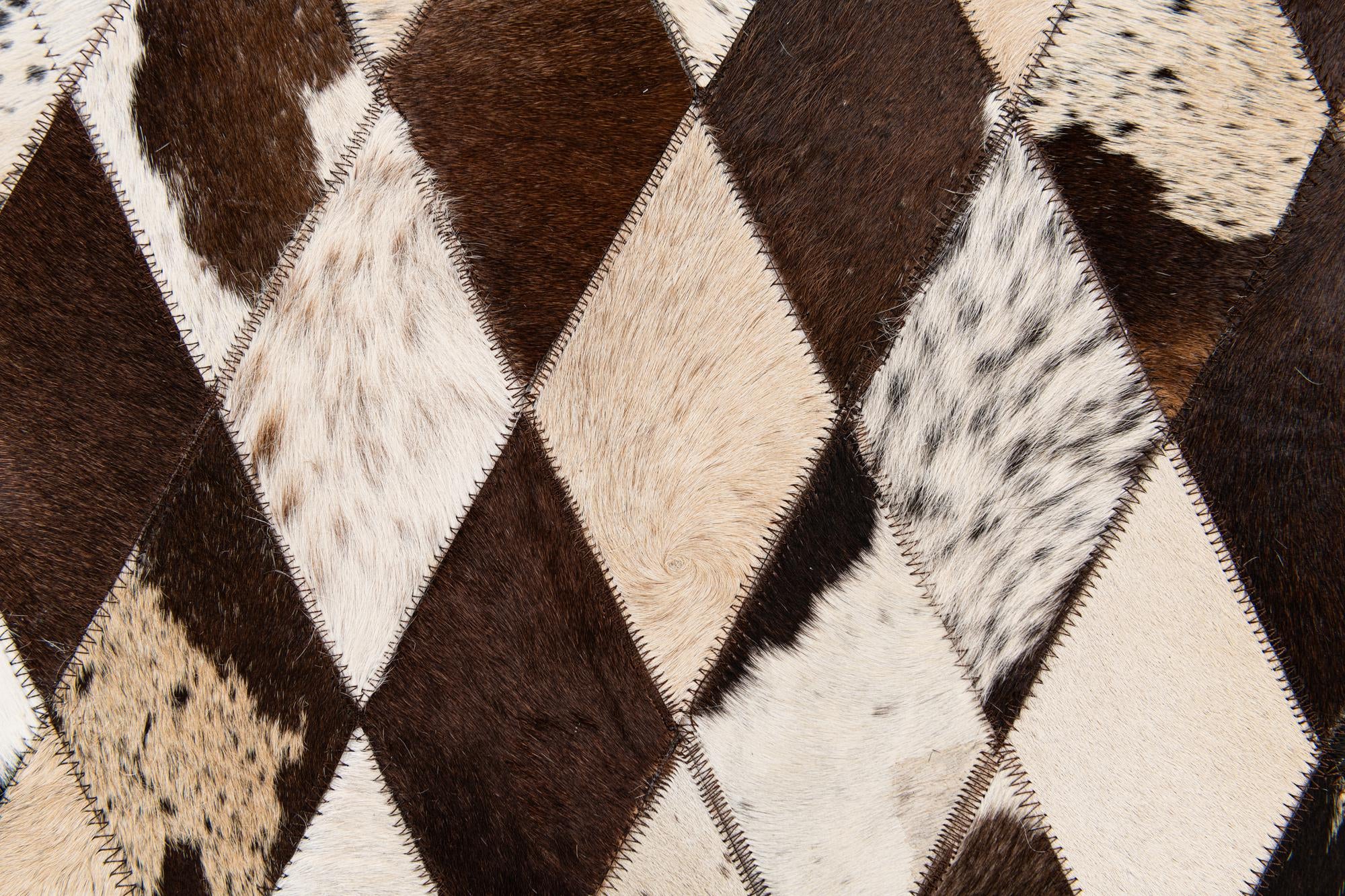 4' 8 x 6' 9 Cowhide Stocks Rug