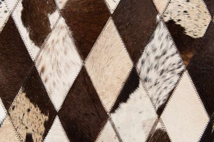 4' 8 x 6' 9 Cowhide Stocks Rug