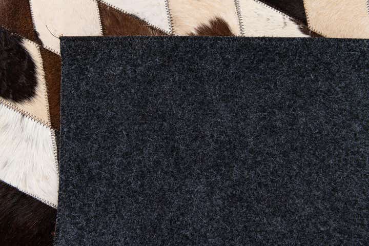 4' 8 x 6' 9 Cowhide Stocks Rug