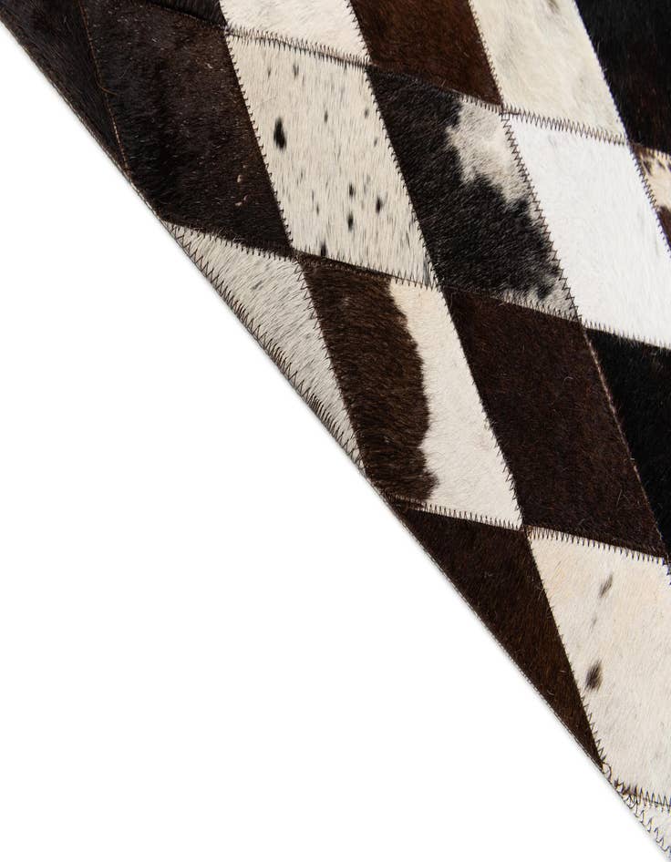 Detail image of 4' 8 x 6' 9 Cowhide Stocks Rug