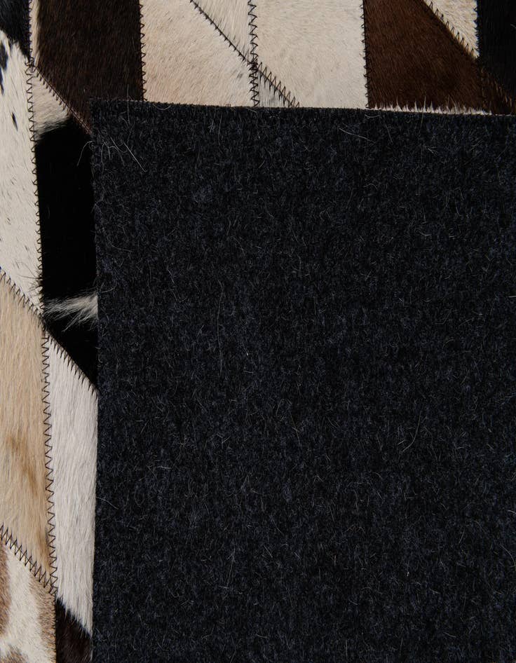 Detail image of 4' 9 x 6' 9 Cowhide Stocks Rug