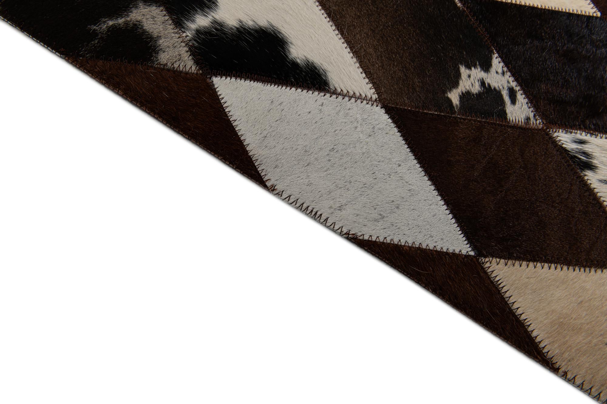 4' 8 x 6' 8 Cowhide Stocks Rug