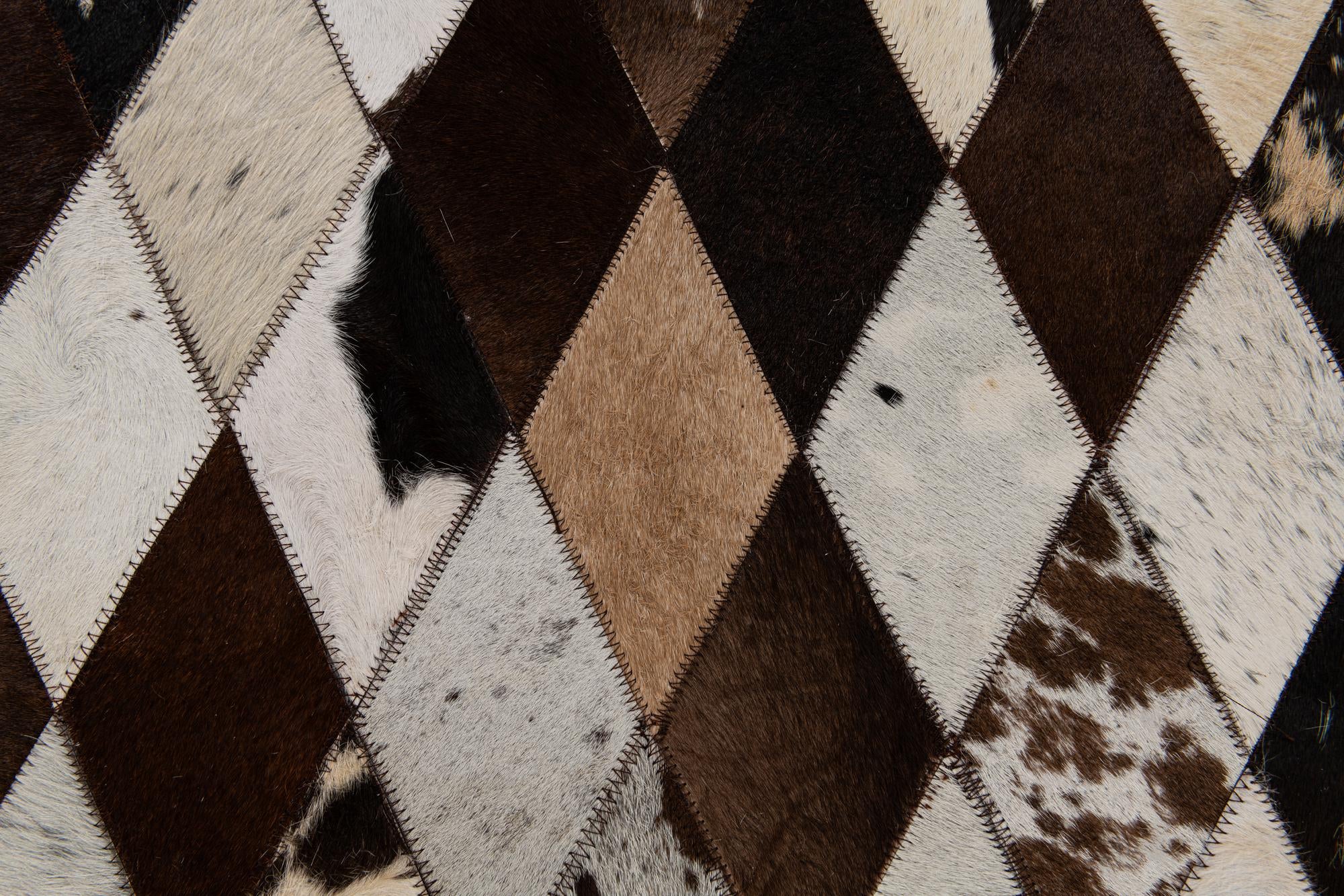 4' 8 x 6' 8 Cowhide Stocks Rug