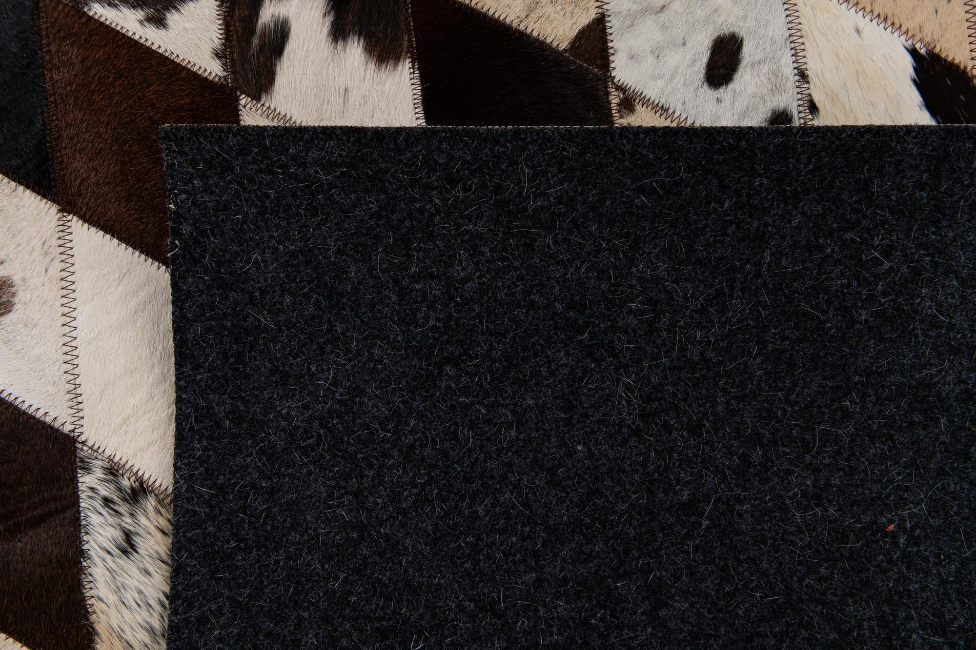 4' 8 x 6' 8 Cowhide Stocks Rug