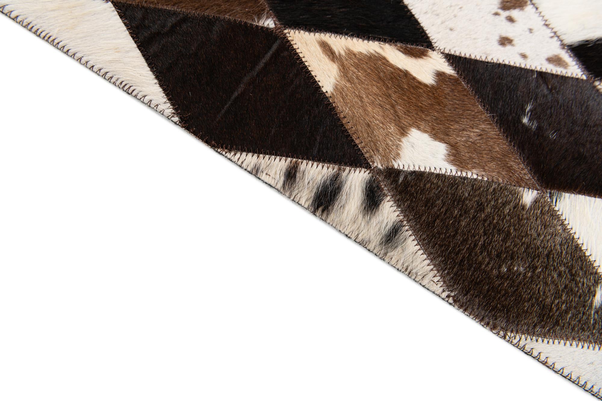 4' 8 x 6' 8 Cowhide Stocks Rug